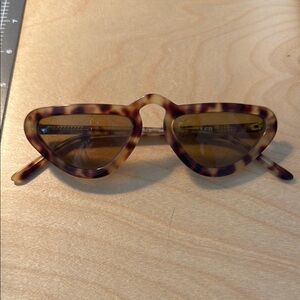 Man Repeller tortoiseshell sunglasses